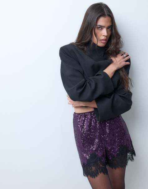 ASOS DESIGN allover sequin shorts in purple with black lace trim - view 1