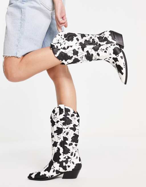 ASOS DESIGN Andi flat western knee boots in cow print