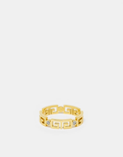 ASOS DESIGN - Anello a fascia in acciaio inossidabile color oro con cristalli e motivo cut-out a onda greca