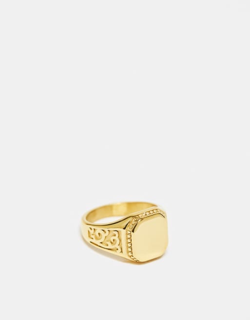 ASOS DESIGN - Anello chevalier in acciaio inossidabile resistente all'acqua con particolari in rilievo color oro