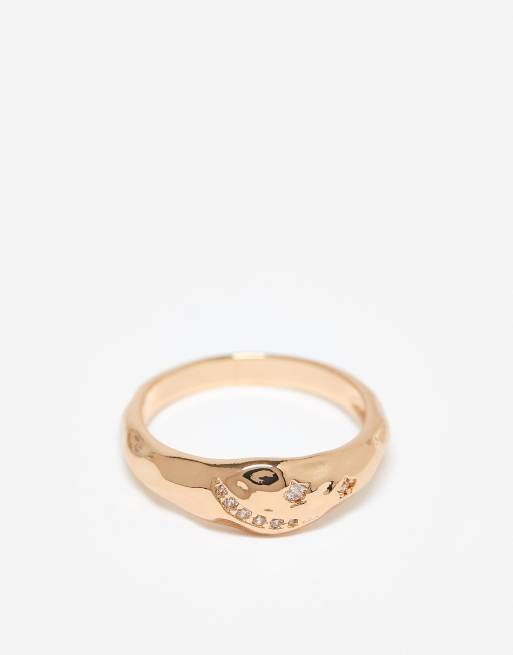ASOS DESIGN - Anello color oro effetto colato con pietre in zirconia cubica