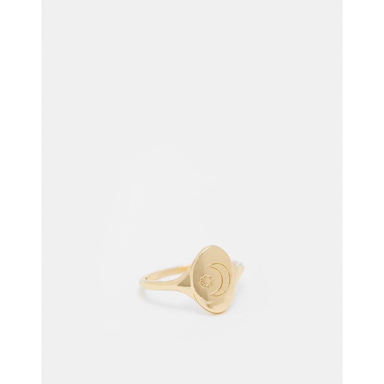 ASOS DESIGN Anello con motivo astrale di stella e luna color oro