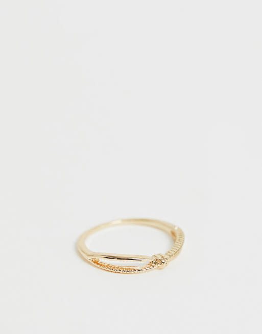 ASOS DESIGN - Anello per pollice oro con nodo e croce