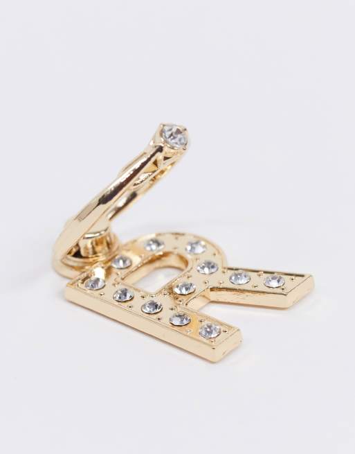 ASOS DESIGN - Anello per telefono personalizzato con lettera 