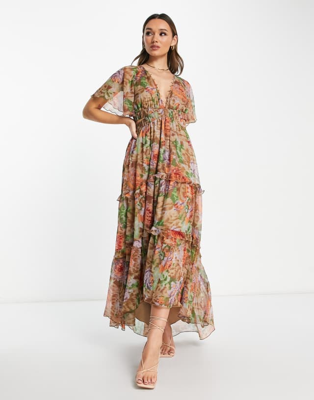 ASOS DESIGN angel sleeve plunge tiered maxi dress with cut out and rouleaux detail in blurred floral print