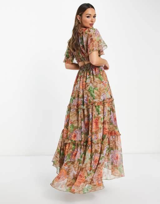 ASOS DESIGN angel sleeve plunge tiered maxi dress with cut out and rouleux detail in blurred floral print