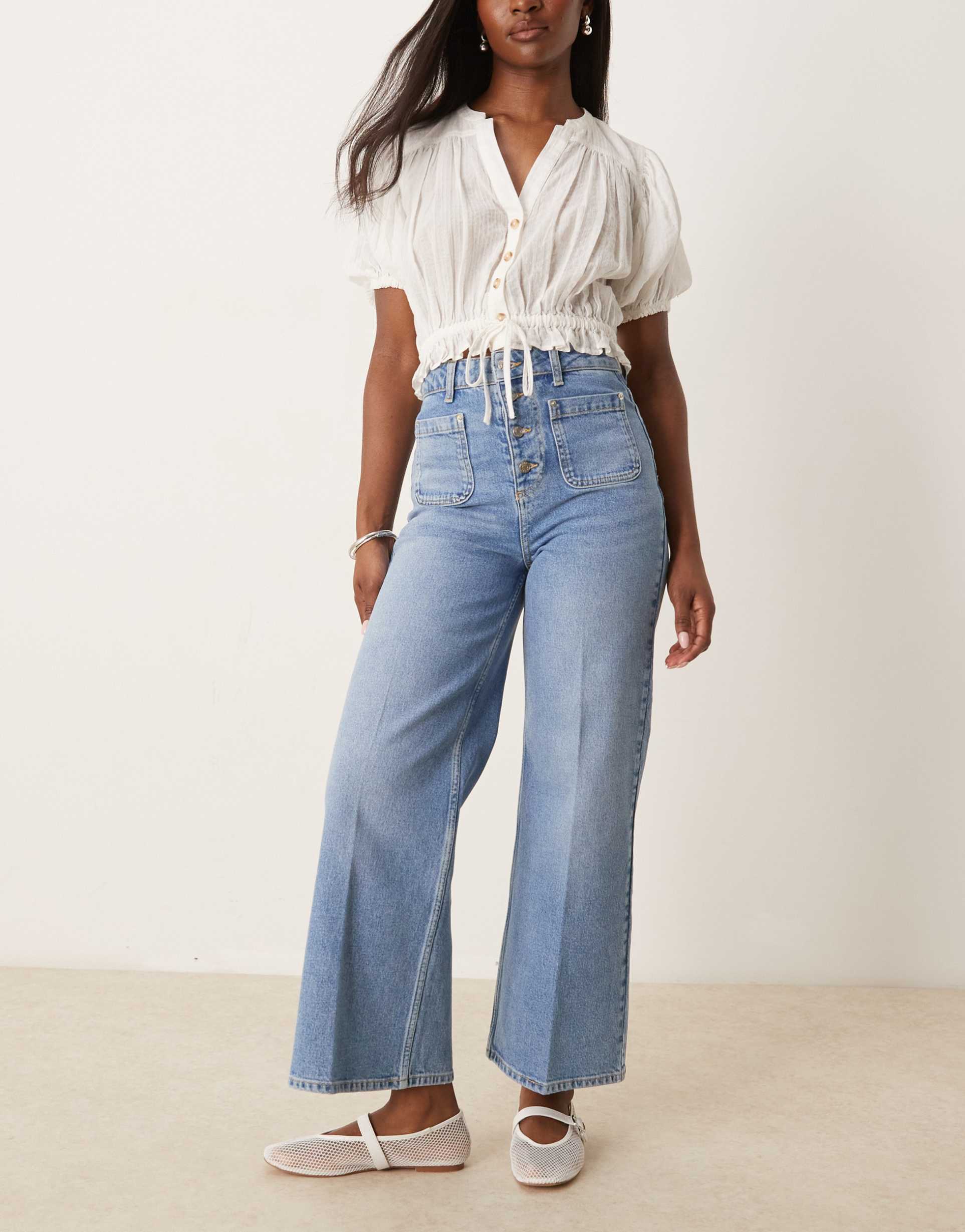 asos design ankle grazer jean with button front in lightwash