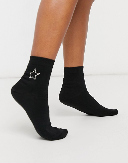 ASOS DESIGN ankle sock with star hotfix in black