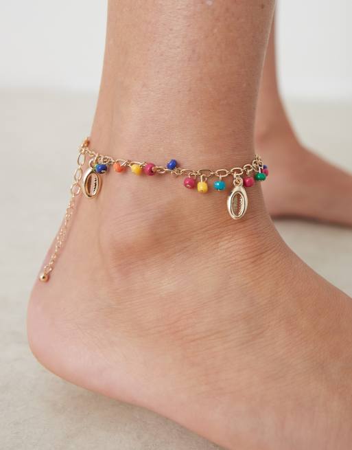 ASOS DESIGN anklet with multi colored beads and shell charms in gold tone