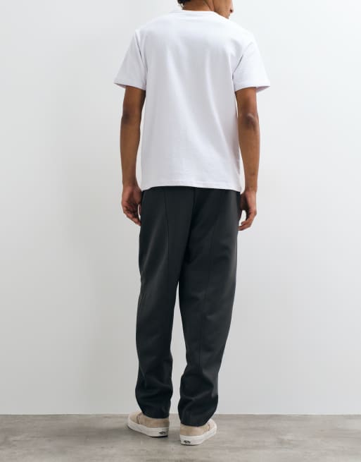 ASOS DESIGN Anzughose mit elastischem Bund, Oversize, konisch zulaufend in Anthrazit, 4 von 5