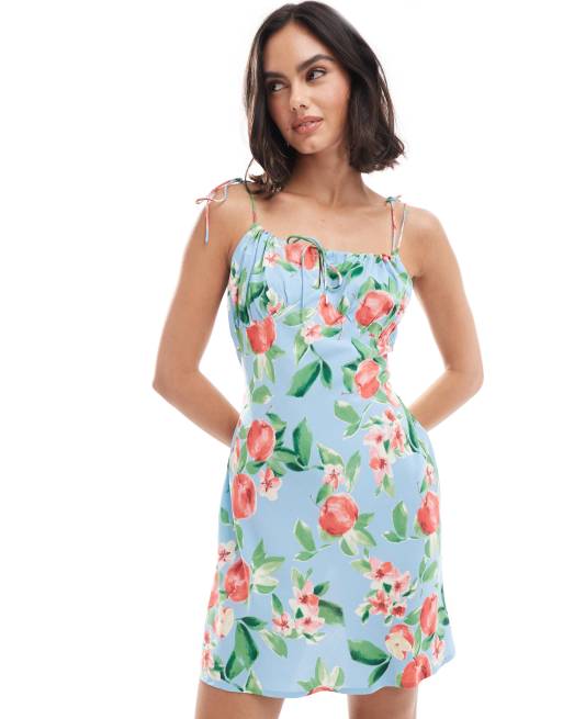 ASOS DESIGN – Äppelmönstrad miniklänning med axelband och rynkad byst