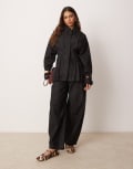 [ASOS DESIGN] ASOS DESIGN arch leg pants in black 14 Black