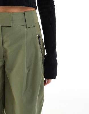 ASOS DESIGN arch leg zip detail trouser in khaki