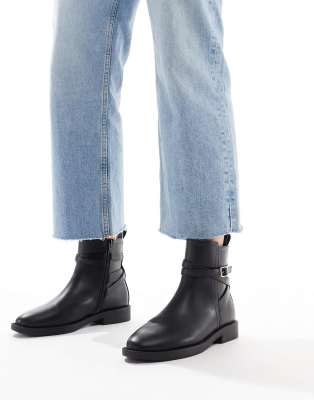 Aria flat chelsea boots with buckle detail in black