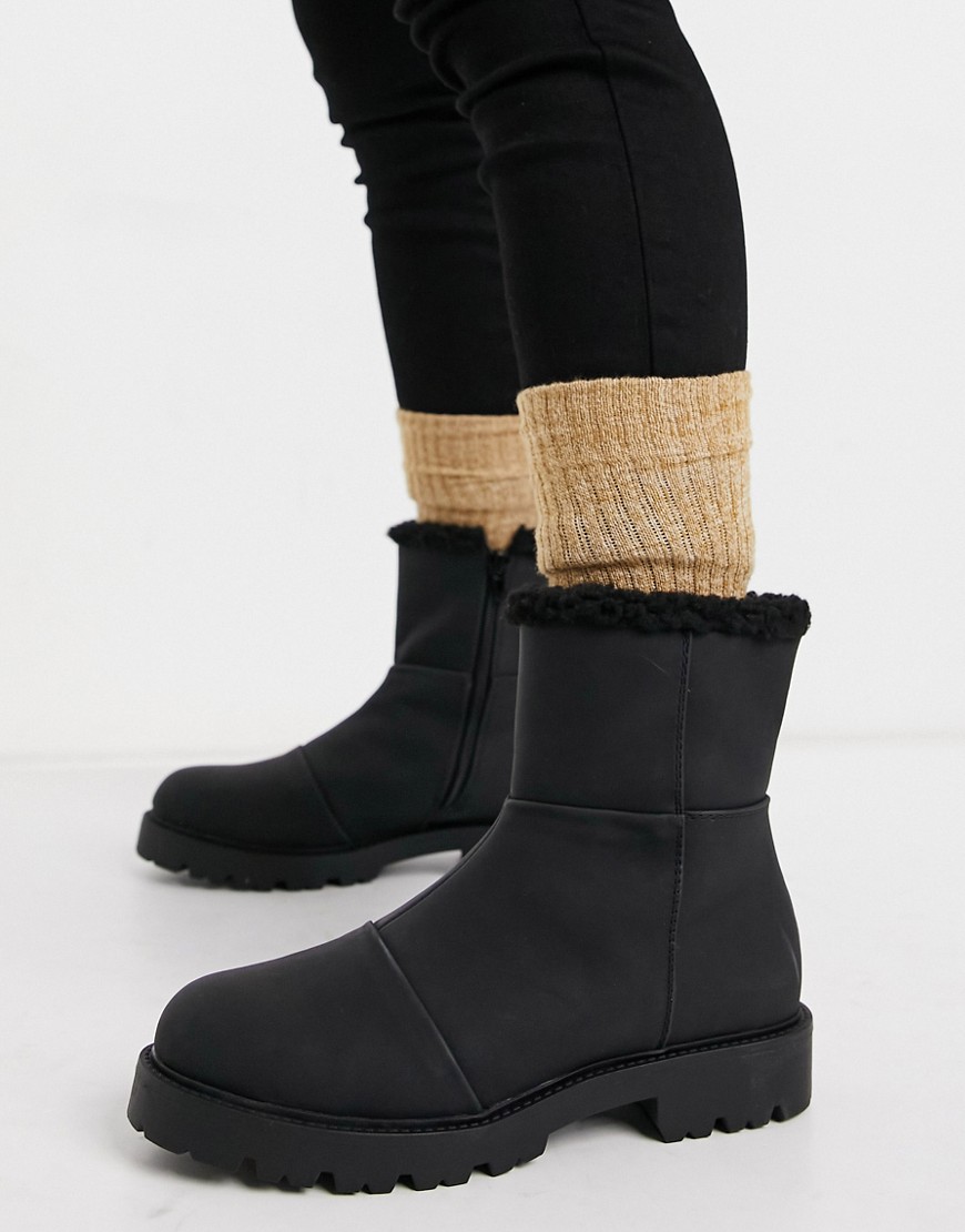 ASOS DESIGN Arlo pull on boots with borg lining in black