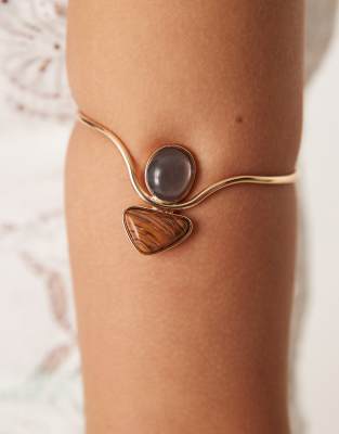 ASOS DESIGN arm cuff with faux semi precious design in gold tone