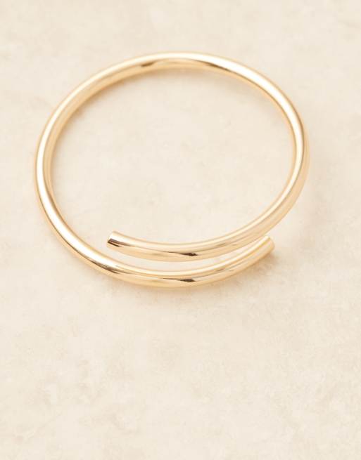 ASOS DESIGN arm cuff with wraparound design in gold tone
