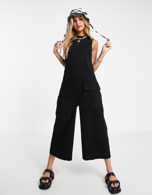 ASOS DESIGN – Ärmelloser, minimalistischer Jumpsuit aus Twill in Schwarz 