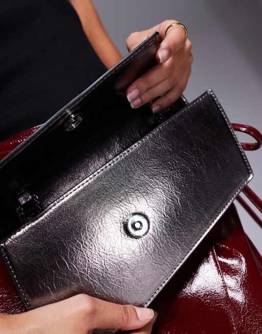 ASOS DESIGN asymmetric clutch bag with chain strap in gunmetal, 2 of 4