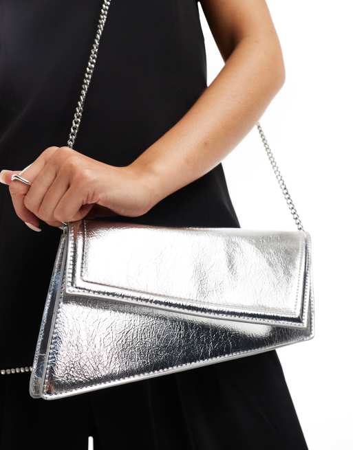 ASOS DESIGN asymmetric clutch bag with chain strap in silver