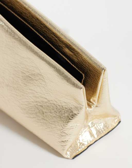 ASOS DESIGN asymmetric clutch in metallic gold, 3 of 4