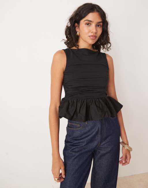 ASOS DESIGN asymmetric contrast fabric peplum hem top in black