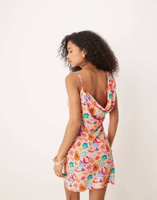 ASOS Design Asymmetric Cowl Neck Mini Dress in Pink Postcard print-Multi