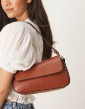 Mango mini bucket bag with gold tone accents in red
