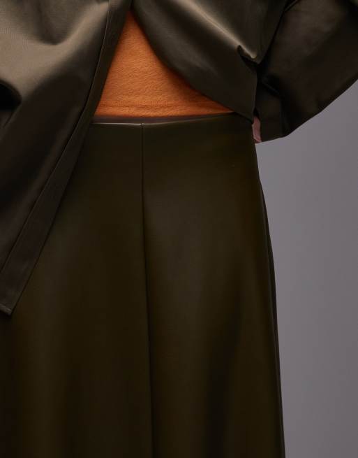 ASOS DESIGN asymmetric handkerchief hem mid rise PU skirt in olive, 4 of 5