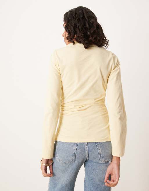 ASOS DESIGN asymmetric hem long sleeve ruched side top in yellow