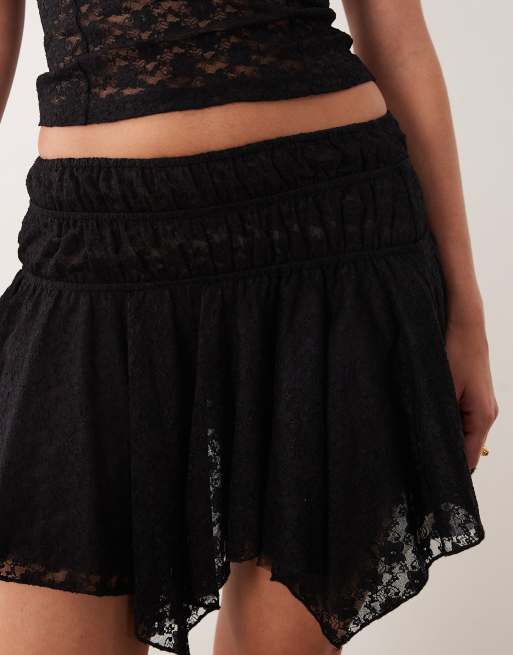 ASOS DESIGN asymmetric lace layered mini skirt in black, 4 of 5