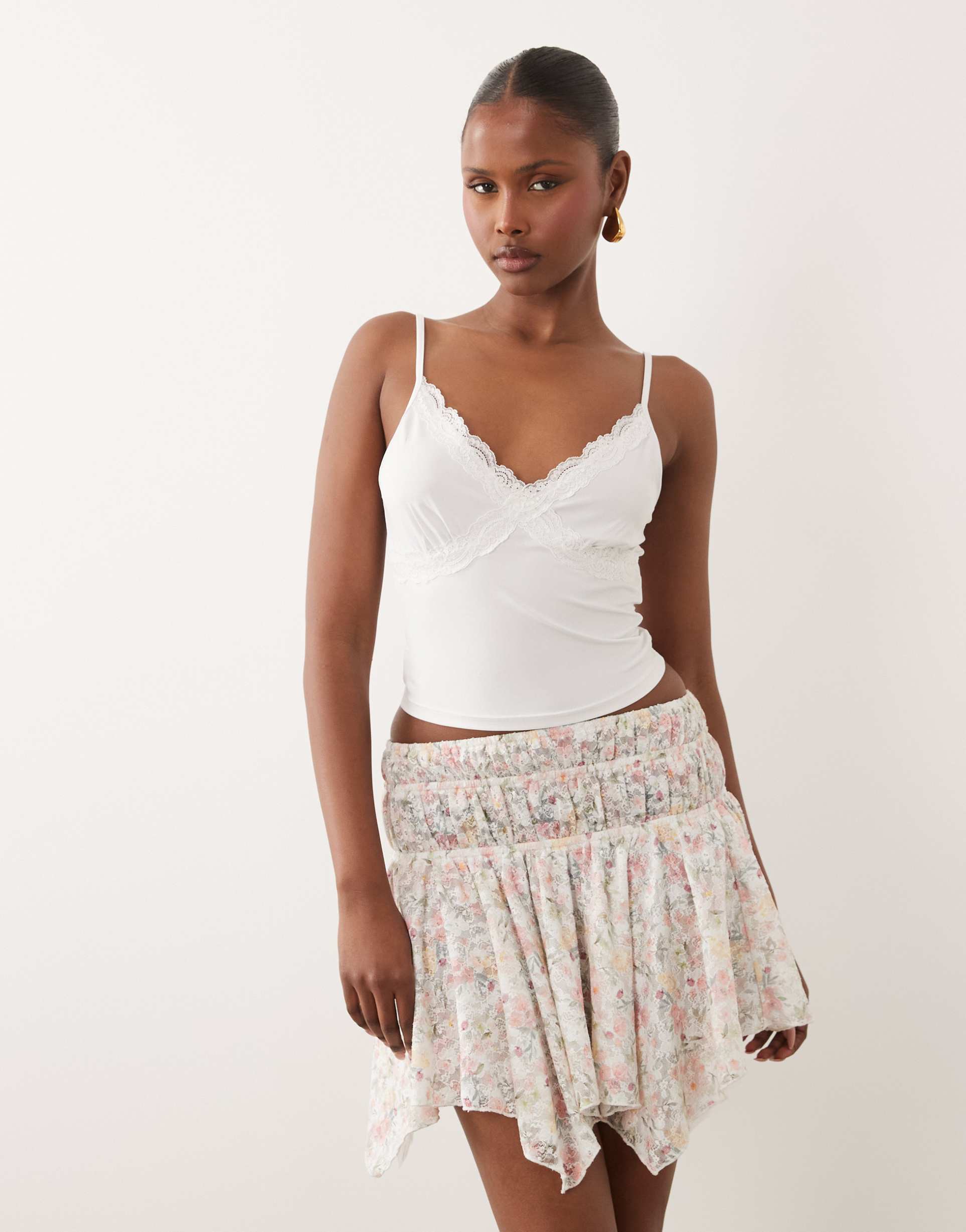 asos design asymmetric lace layered mini skirt in pink floral