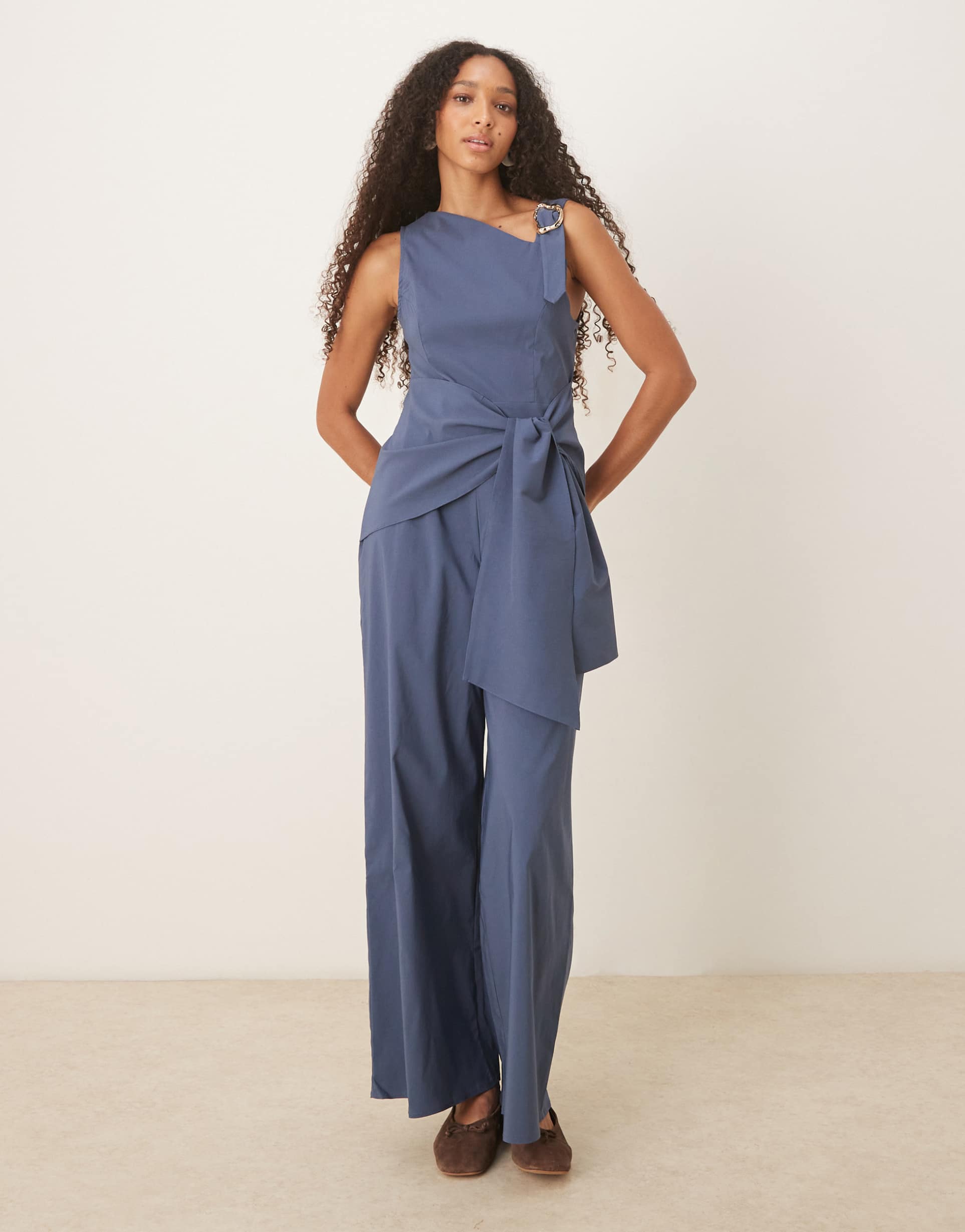 asos design asymmetric liquid gold tone strap detail jumpsuit with wrap over in navy