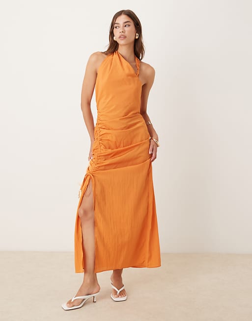 asos dress LUXE Pleated Bandeau Mini with velvet belt in Gold The ASOS DESIGN fluted sleeve tie waist corduroy mini dress in burgundy is a stylish addition to your winter wardrobe ASOS Design - Asymmetric Midi