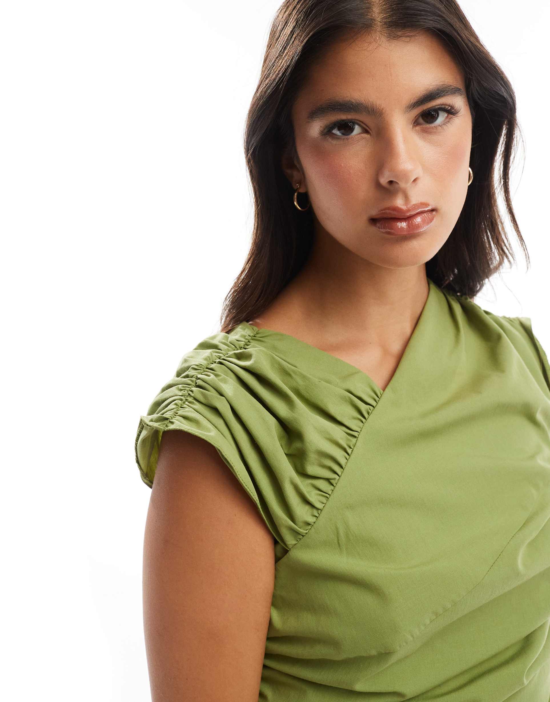 asos design asymmetric mini dress with puffball hem and sleeve in olive green