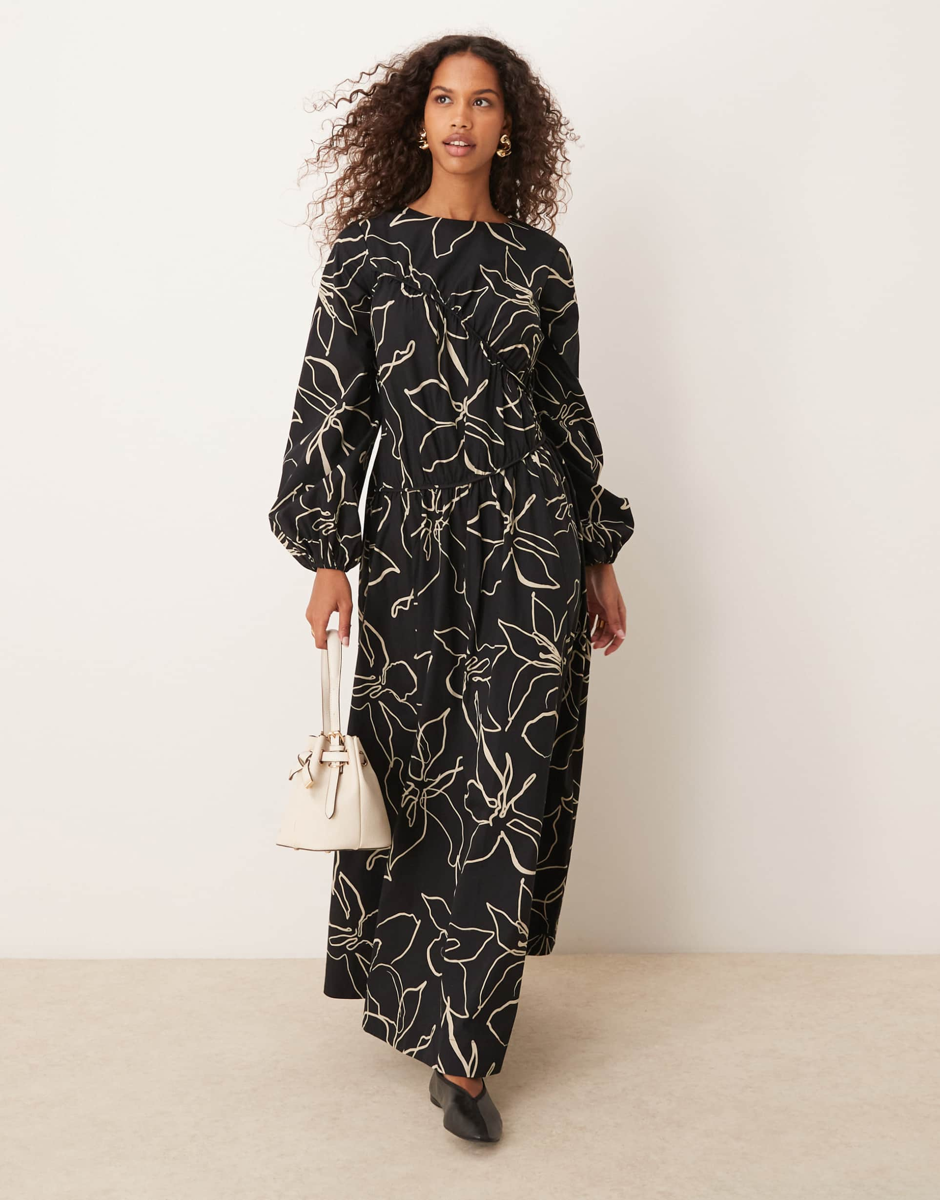 asos design asymmetric ruched maxi dress in black squiggle floral