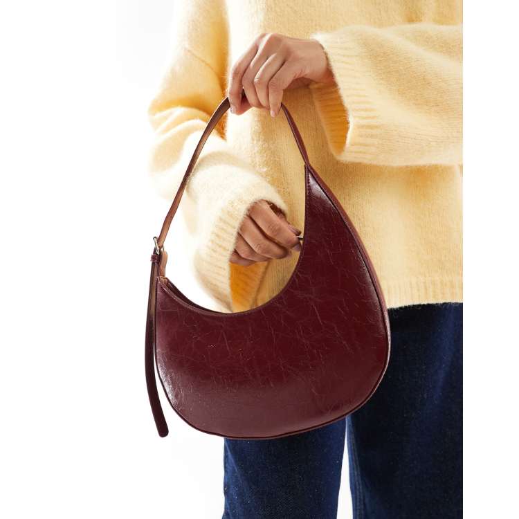 ASOS DESIGN asymmetric scoop shoulder bag with buckle detail