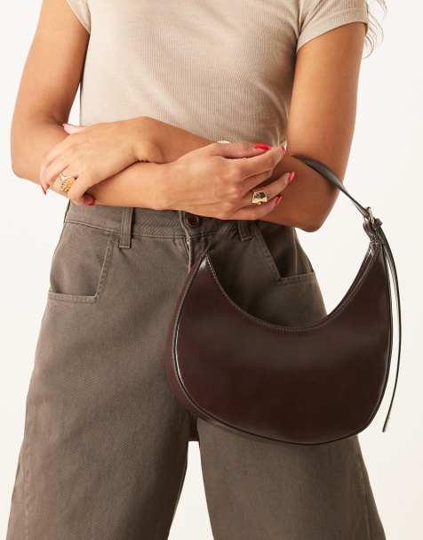 ASOS DESIGN asymmetric scoop shoulder bag with buckle detail in chocolate - view 1