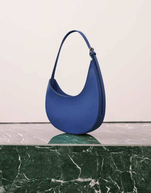 ASOS DESIGN asymmetric scoop shoulder bag with buckle detail in cobalt blue, 2 of 4