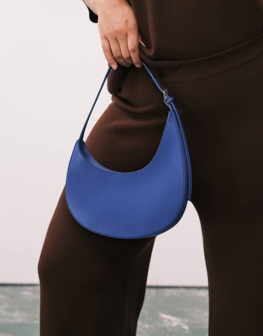 ASOS DESIGN asymmetric scoop shoulder bag with buckle detail in cobalt blue, 3 of 4