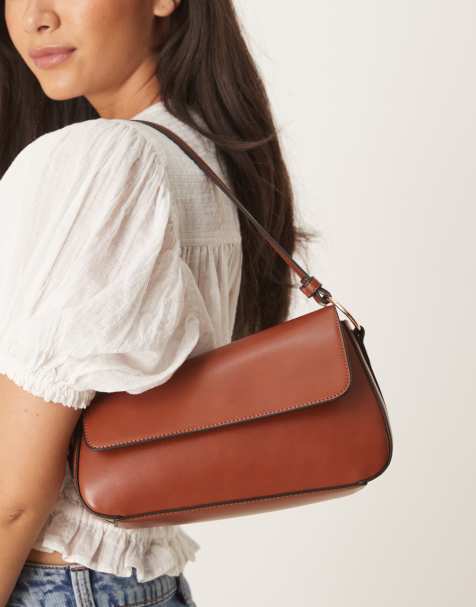 ASOS DESIGN asymmetric shoulder bag with front flap in dark tan - view 1