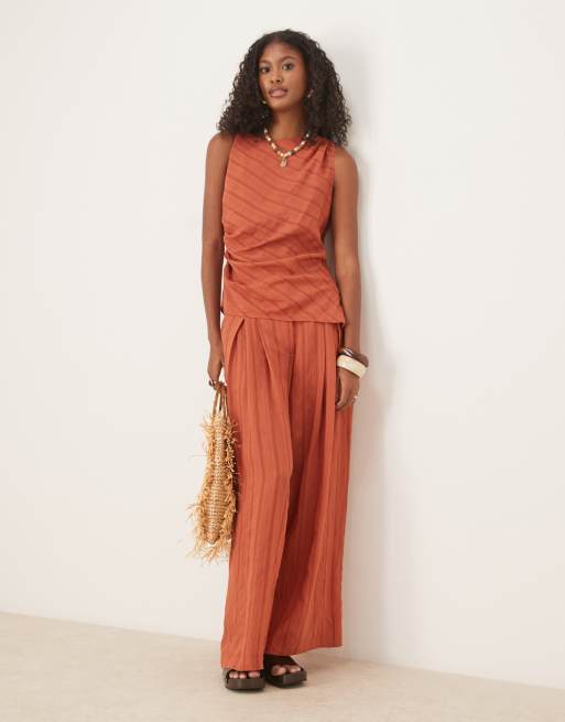 ASOS DESIGN asymmetric textured stripe twist detail top & palazzo stripe trousers co-ord in rust