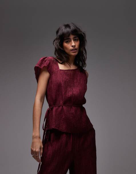 ASOS DESIGN crinkle asymmetric tie waist top co-ord in burgundy 