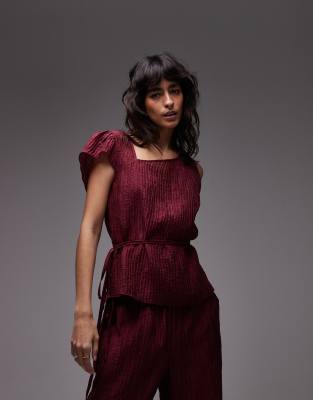 ASOS DESIGN asymmetric tie waist top in sheer crinkle in burgundy - part of a se