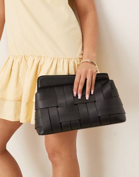 ASOS DESIGN asymmetric woven grab clutch bag in black - view 1