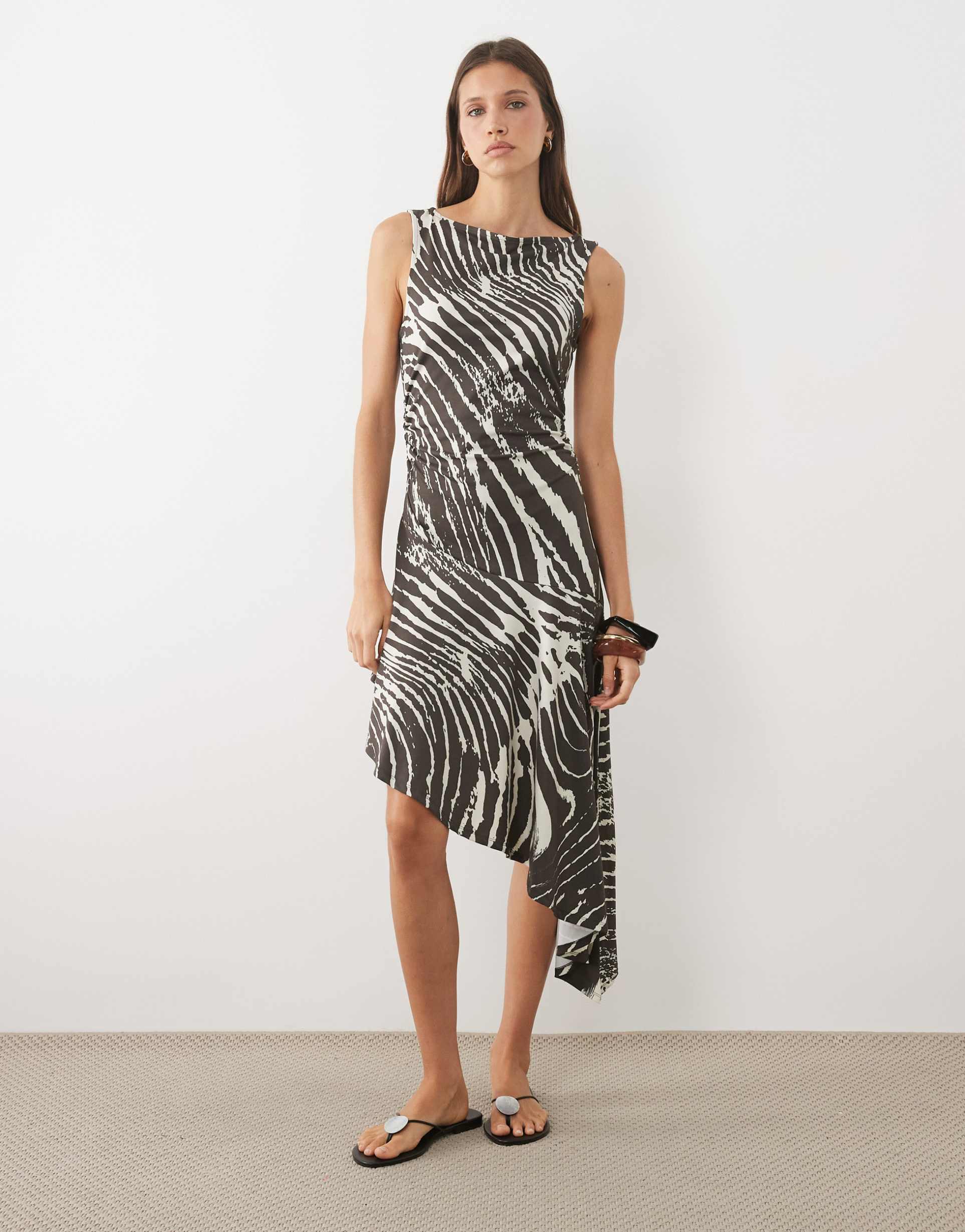 asos design asymmetrical mini dress in zebra print