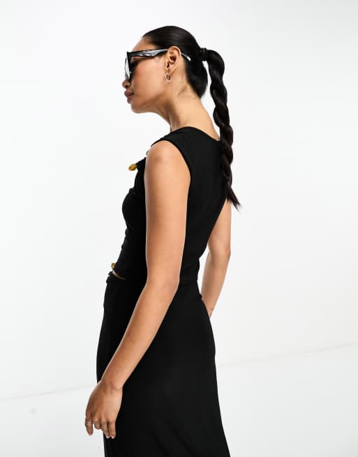 ASOS DESIGN – Asymmetrisch geschnittenes Oberteil in Schwarz mit Metalldetail an der Schulter, 4 von 4