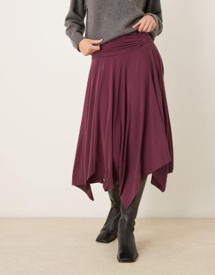 ASOS DESIGN - Asymmetrischer Modal-Midirock in Burgunderrot mit Zipfelsaum