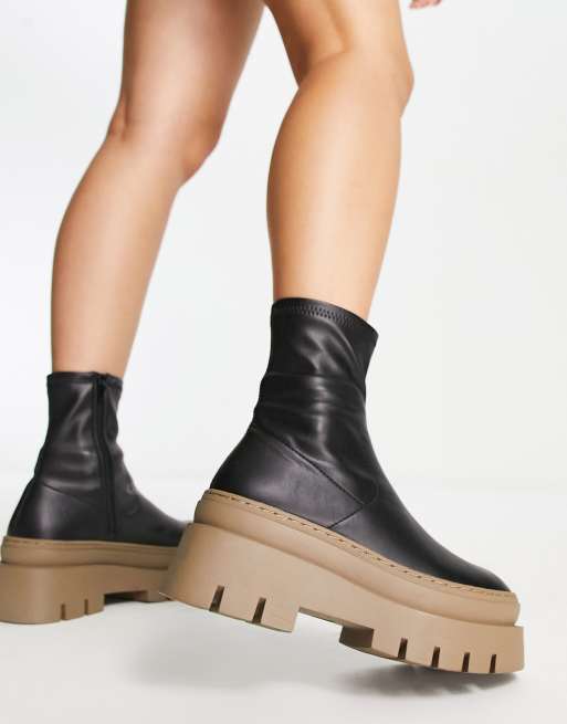 ASOS DESIGN Atlas chunky sock boots in black with tan sole