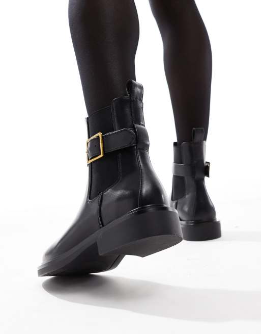 ASOS DESIGN Aurora Bottines larges plates avec laniere a boucle Noir